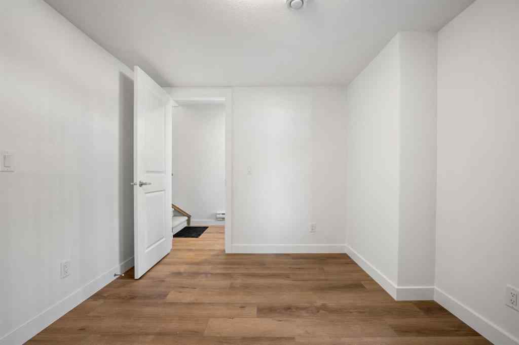 MLS® A2262501 - 8331 8 Avenue SW in West Springs Calgary, Residential