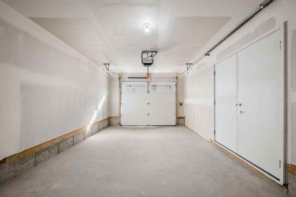 MLS® A2262501 - 8331 8 Avenue SW in West Springs Calgary, Residential