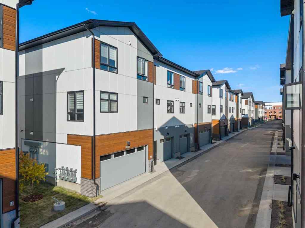 MLS® A2262501 - 8331 8 Avenue SW in West Springs Calgary, Residential