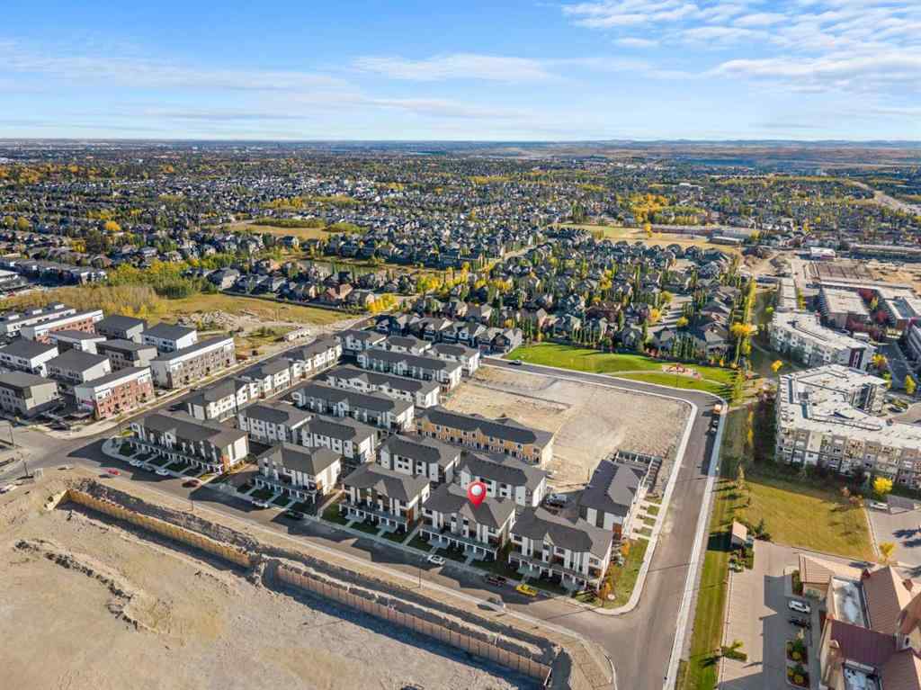 MLS® A2262501 - 8331 8 Avenue SW in West Springs Calgary, Residential