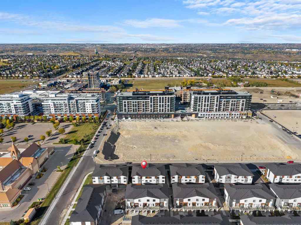 MLS® A2262501 - 8331 8 Avenue SW in West Springs Calgary, Residential