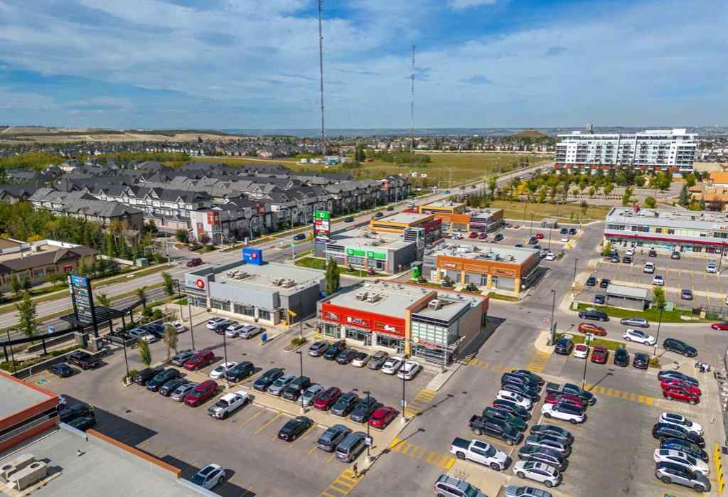 MLS® A2262501 - 8331 8 Avenue SW in West Springs Calgary, Residential