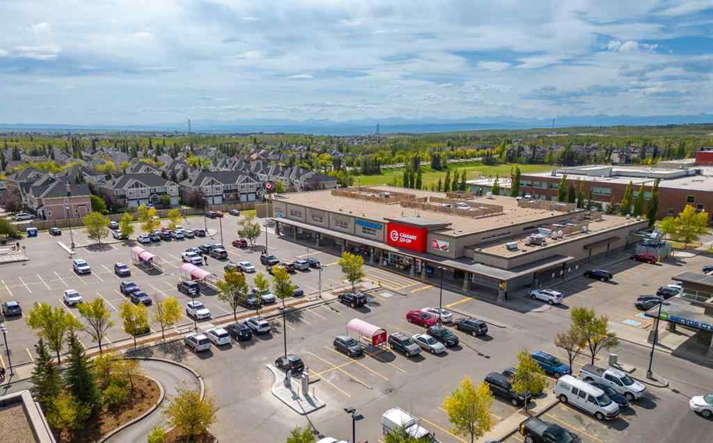 MLS® A2262501 - 8331 8 Avenue SW in West Springs Calgary, Residential