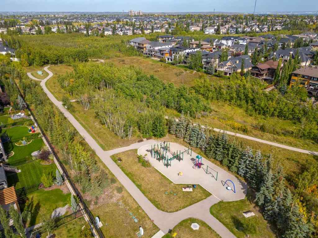 MLS® A2262501 - 8331 8 Avenue SW in West Springs Calgary, Residential