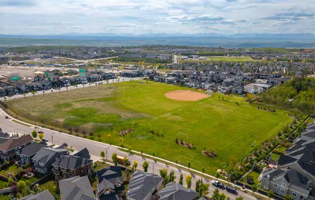 MLS® A2262501 - 8331 8 Avenue SW in West Springs Calgary, Residential