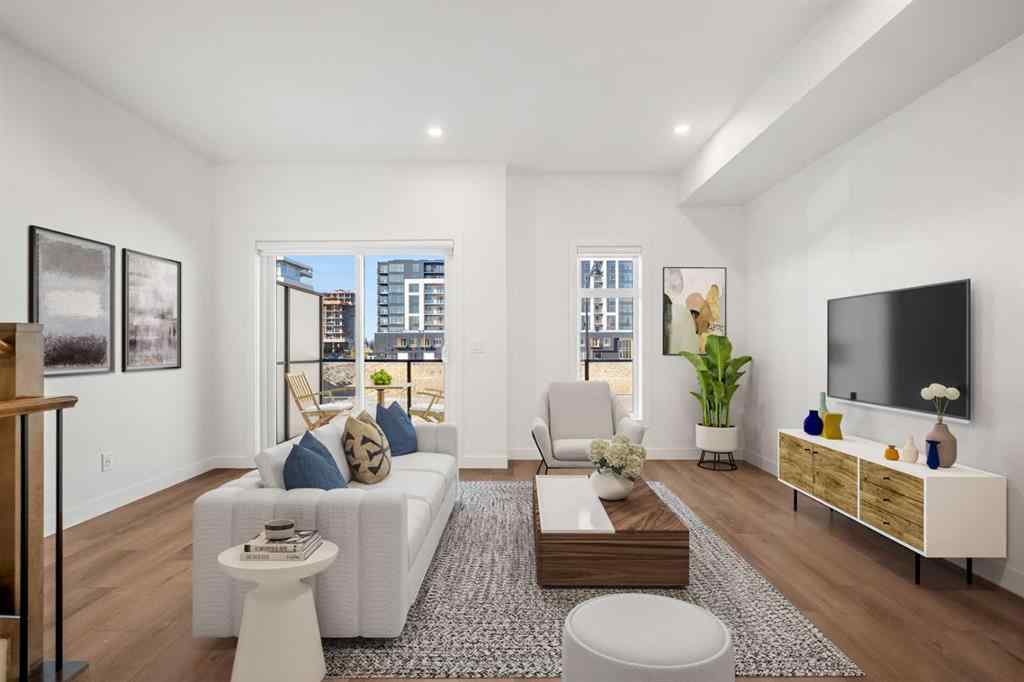 MLS® A2262501 - 8331 8 Avenue SW in West Springs Calgary, Residential