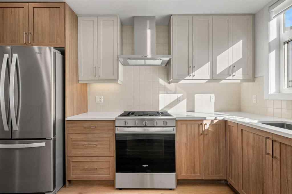 MLS® A2262501 - 8331 8 Avenue SW in West Springs Calgary, Residential