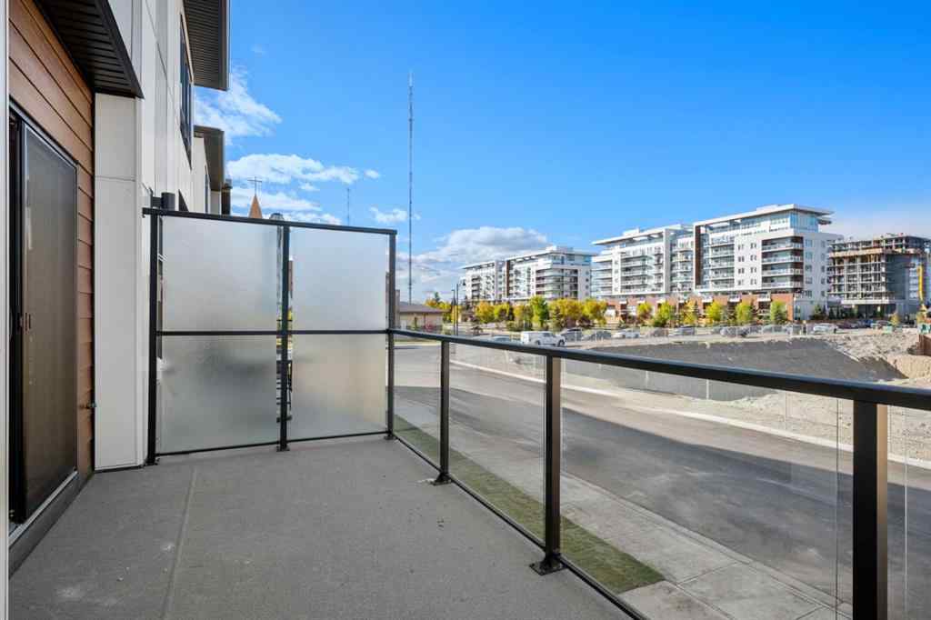 MLS® A2262501 - 8331 8 Avenue SW in West Springs Calgary, Residential