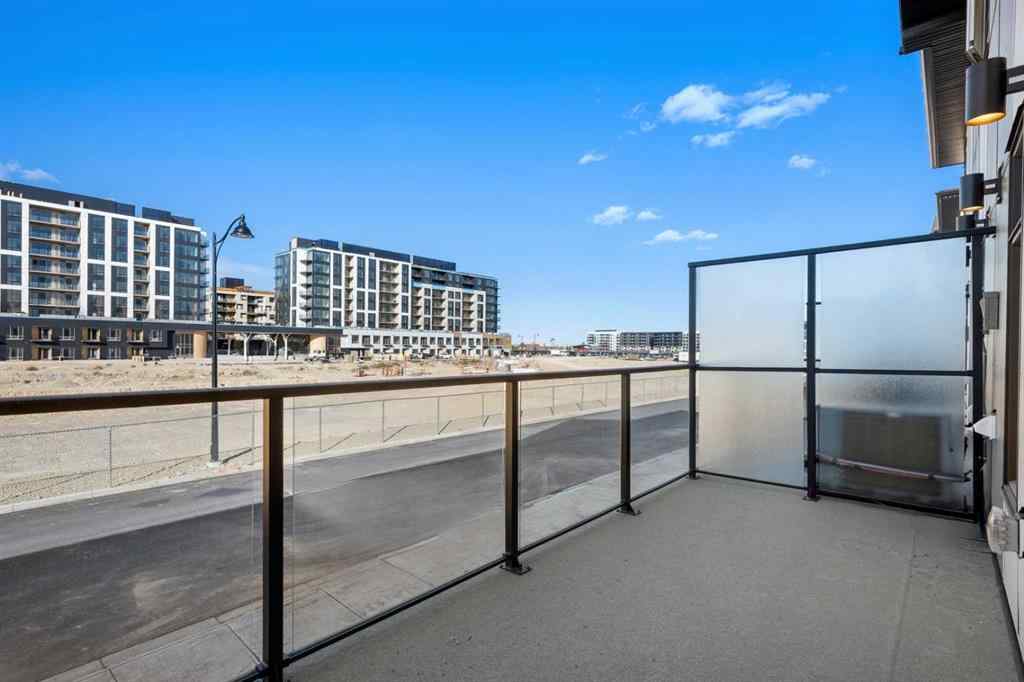 MLS® A2262501 - 8331 8 Avenue SW in West Springs Calgary, Residential