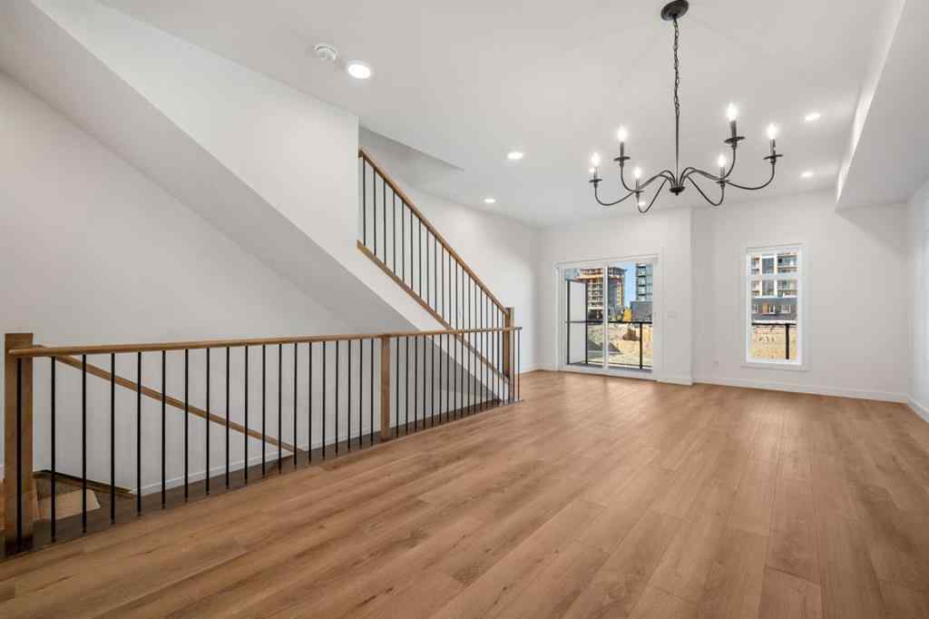 MLS® A2262501 - 8331 8 Avenue SW in West Springs Calgary, Residential