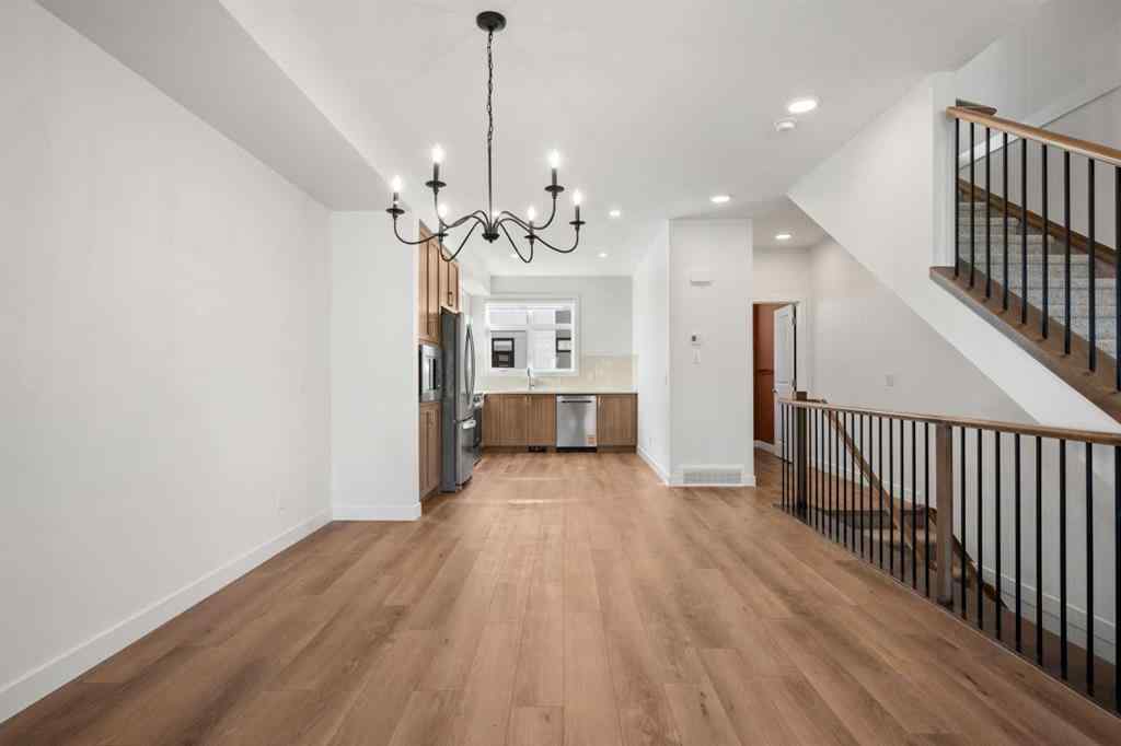 MLS® A2262501 - 8331 8 Avenue SW in West Springs Calgary, Residential