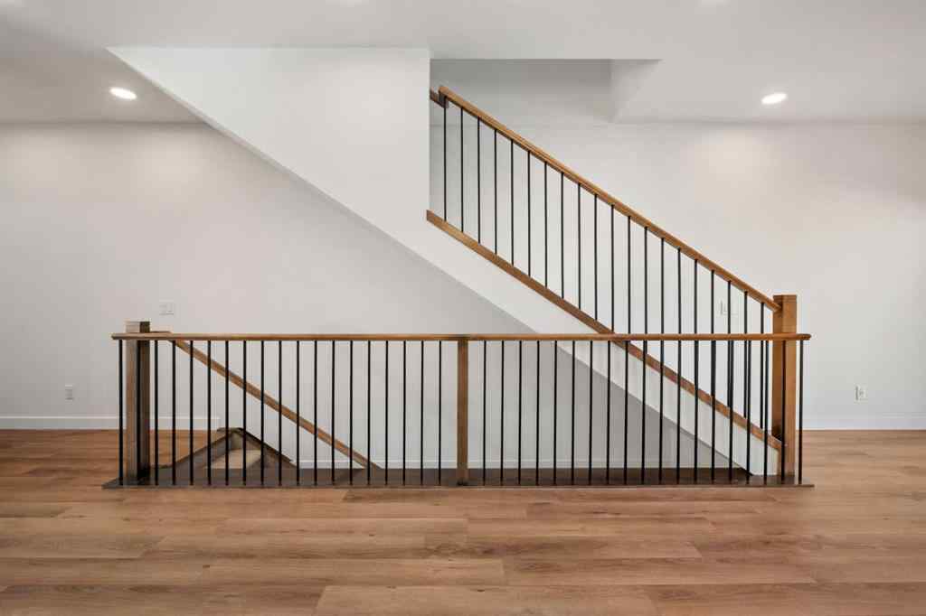 MLS® A2262501 - 8331 8 Avenue SW in West Springs Calgary, Residential