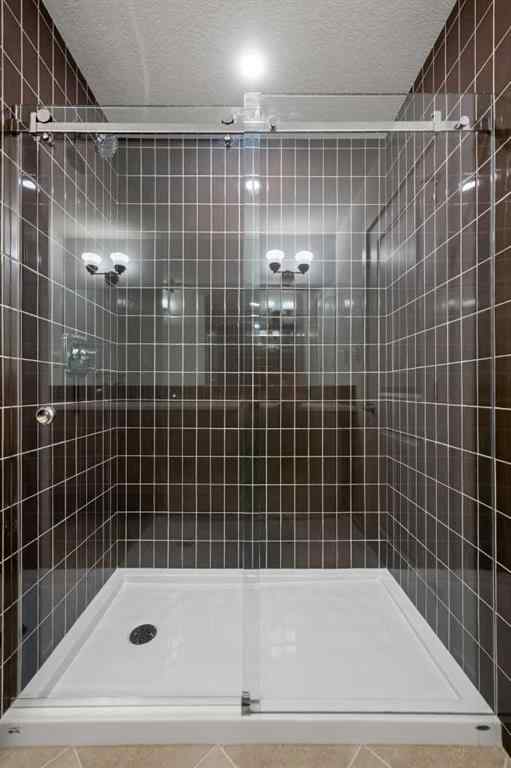 MLS® A2262501 - 8331 8 Avenue SW in West Springs Calgary, Residential