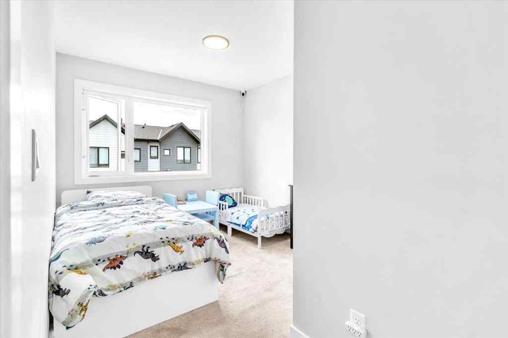 MLS® A2262510 - 203 Evanscrest Square NW in Evanston Calgary, Residential