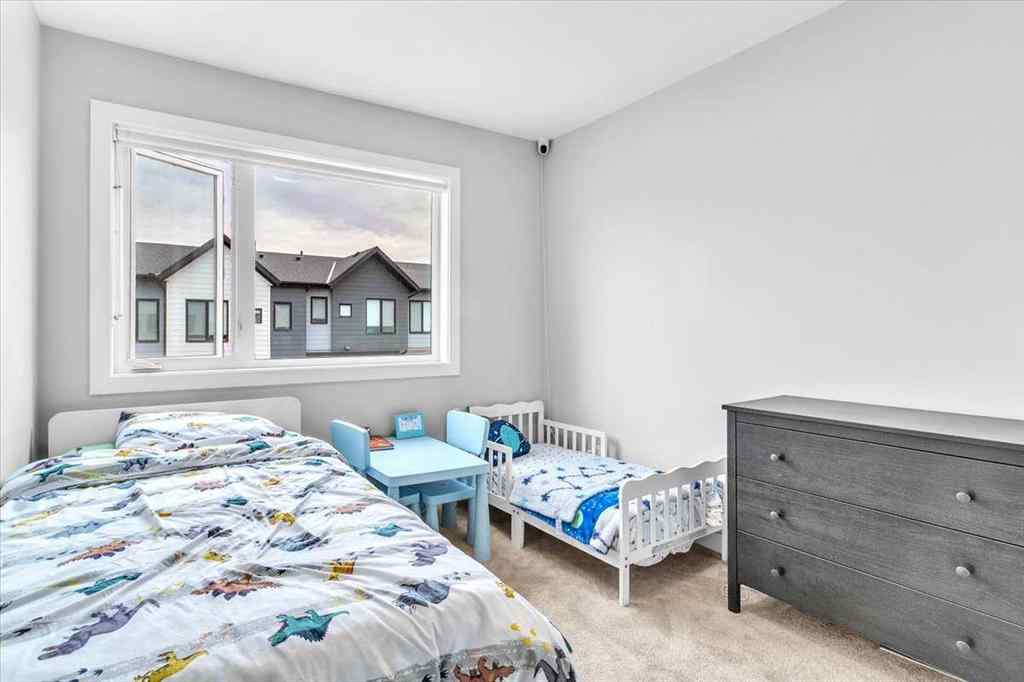 MLS® A2262510 - 203 Evanscrest Square NW in Evanston Calgary, Residential