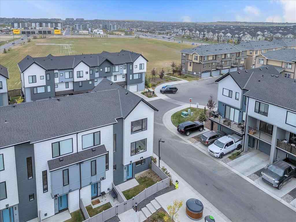 MLS® A2262510 - 203 Evanscrest Square NW in Evanston Calgary, Residential