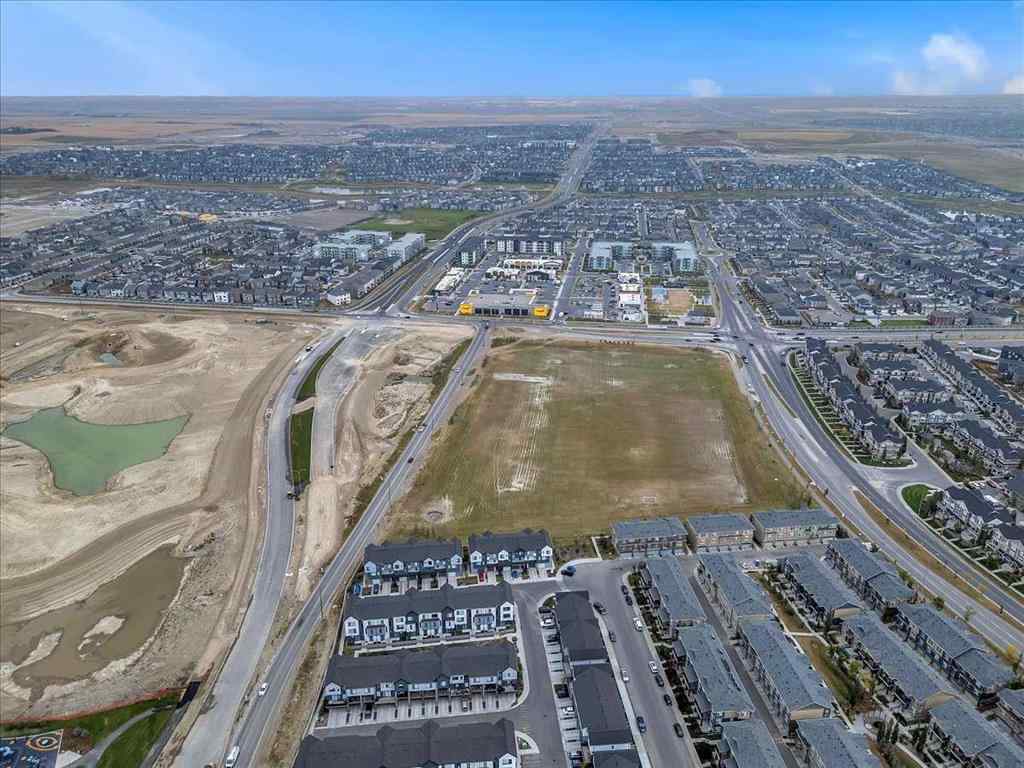 MLS® A2262510 - 203 Evanscrest Square NW in Evanston Calgary, Residential