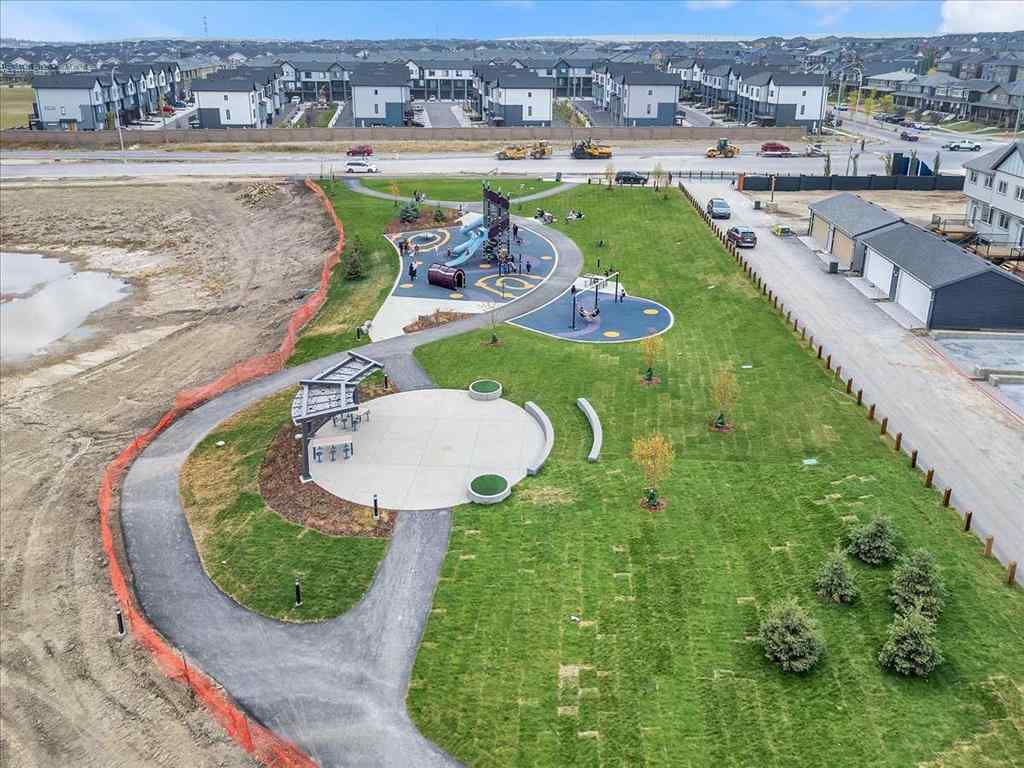 MLS® A2262510 - 203 Evanscrest Square NW in Evanston Calgary, Residential