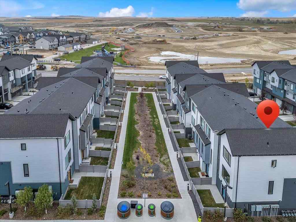 MLS® A2262510 - 203 Evanscrest Square NW in Evanston Calgary, Residential