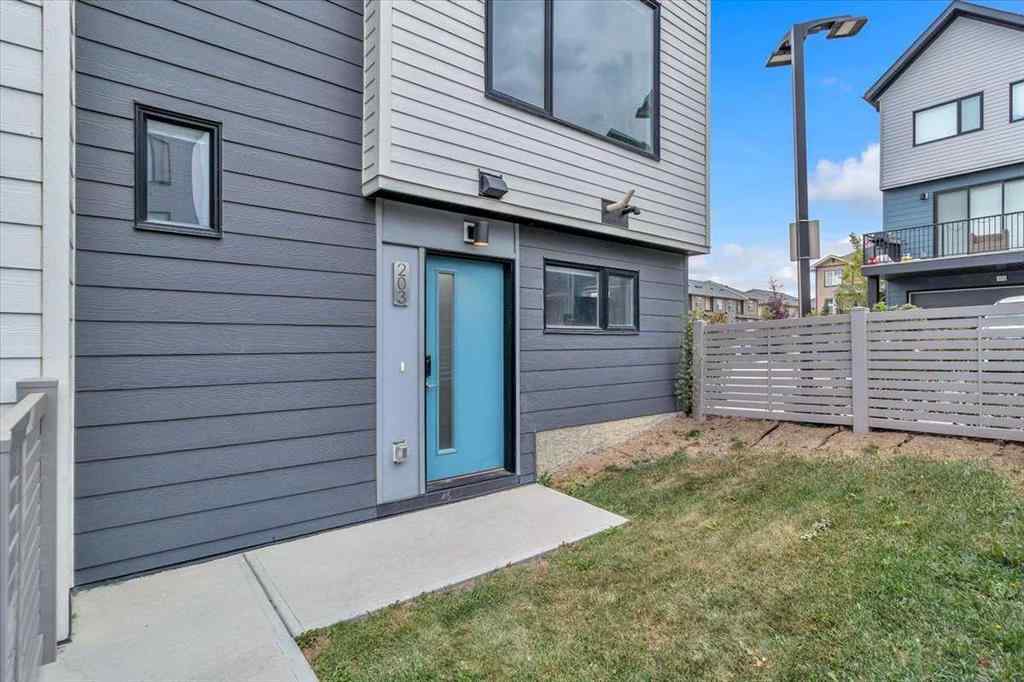 MLS® A2262510 - 203 Evanscrest Square NW in Evanston Calgary, Residential