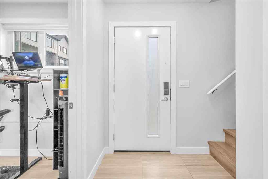 MLS® A2262510 - 203 Evanscrest Square NW in Evanston Calgary, Residential