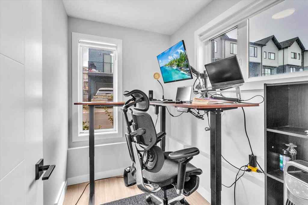 MLS® A2262510 - 203 Evanscrest Square NW in Evanston Calgary, Residential