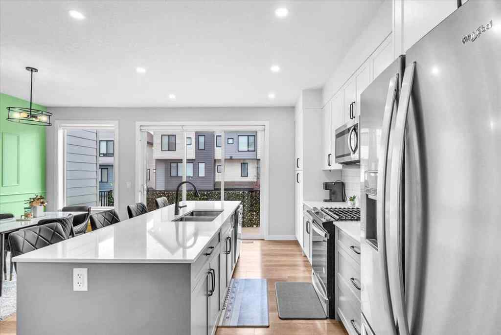 MLS® A2262510 - 203 Evanscrest Square NW in Evanston Calgary, Residential