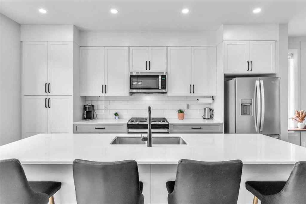 MLS® A2262510 - 203 Evanscrest Square NW in Evanston Calgary, Residential