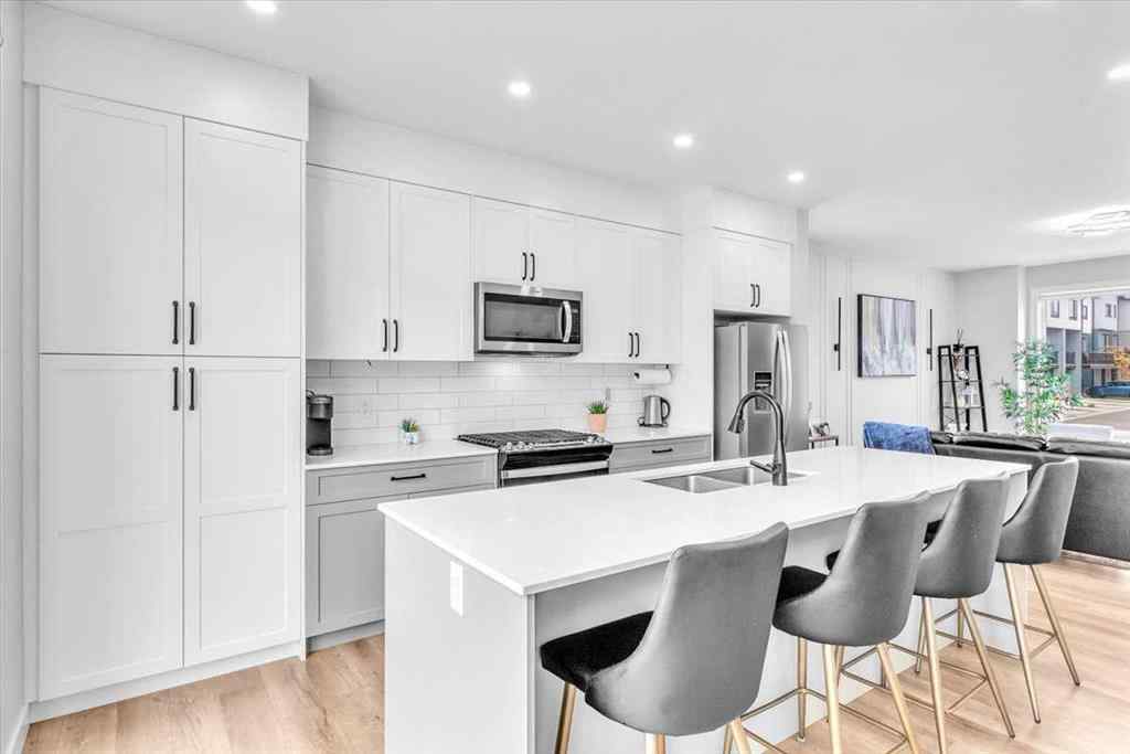 MLS® A2262510 - 203 Evanscrest Square NW in Evanston Calgary, Residential