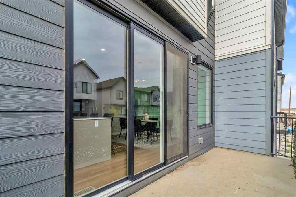 MLS® A2262510 - 203 Evanscrest Square NW in Evanston Calgary, Residential