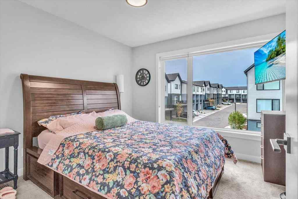 MLS® A2262510 - 203 Evanscrest Square NW in Evanston Calgary, Residential