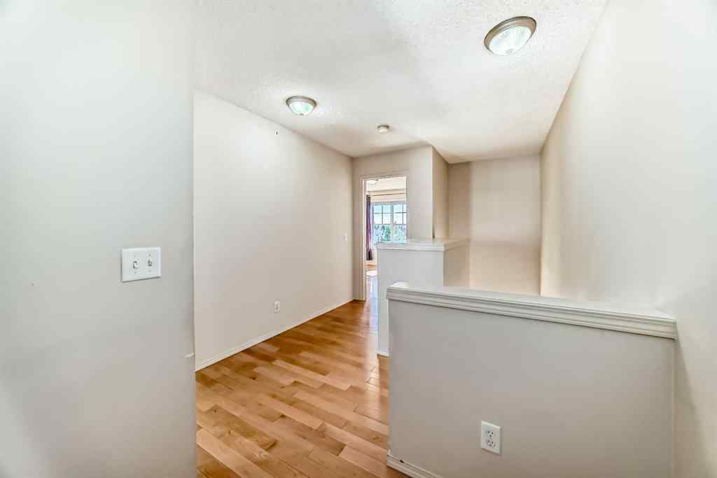 MLS® A2262533 - 63 Toscana Gardens NW in Tuscany Calgary, Residential