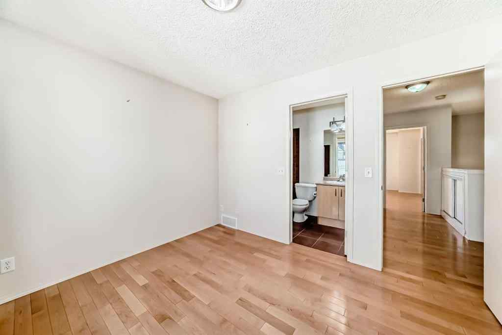 MLS® A2262533 - 63 Toscana Gardens NW in Tuscany Calgary, Residential