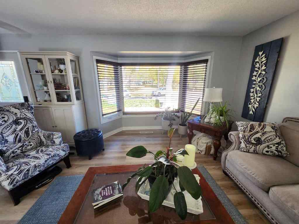 MLS® A2262546 - 8555 Addison Place SE in Acadia Calgary, Residential