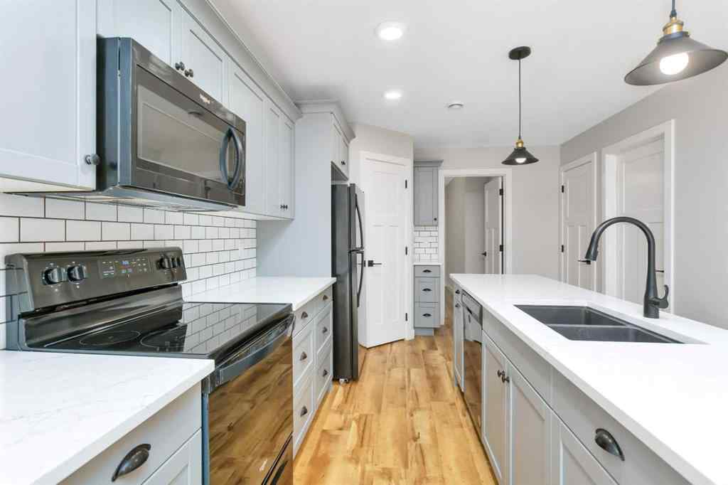 MLS® A2262567 - 5043 56 Street  in Dodds Lake Innisfail, Residential