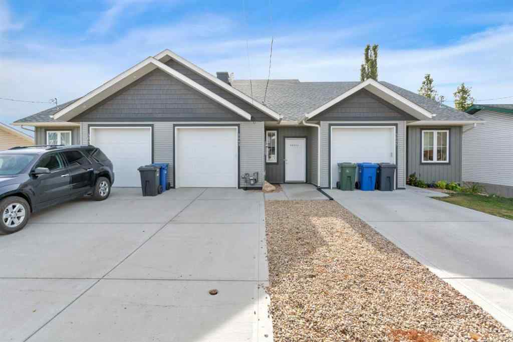 MLS® A2262567 - 5043 56 Street  in Dodds Lake Innisfail, Residential