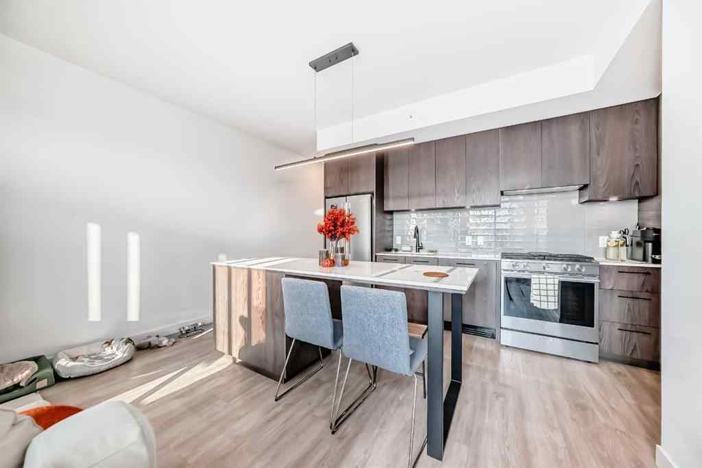 MLS® A2262579 - Unit #311 1107 Gladstone Road NW in Hillhurst Calgary, Residential