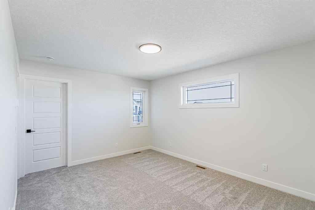 MLS® A2262597 - 34 Amblefield Heights NW in Ambleridge Calgary, Residential