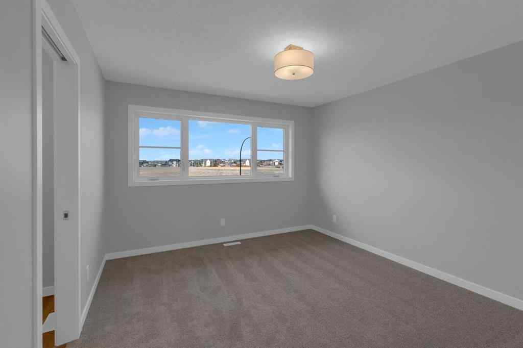 MLS® A2262600 - 567 Carrington Boulevard NW in Carrington Calgary, Residential