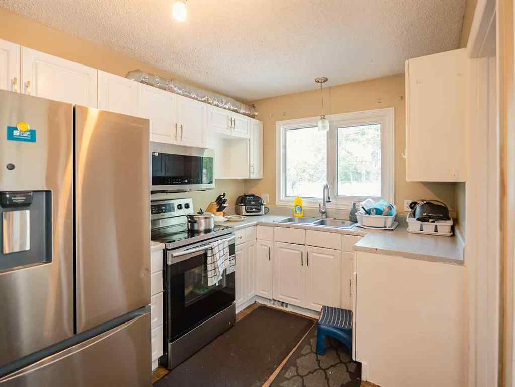 MLS® A2262610 - 9624 82 Avenue  in Patterson Place Grande Prairie, Residential