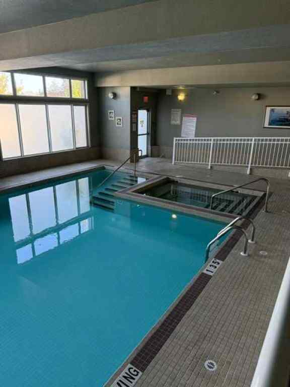 MLS® A2262622 - Unit #203 15 Everstone Drive SW in Evergreen Calgary, Residential