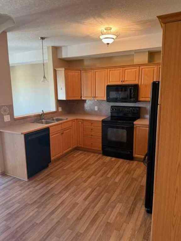 MLS® A2262622 - Unit #203 15 Everstone Drive SW in Evergreen Calgary, Residential