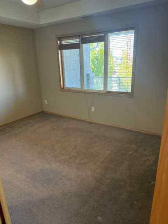 MLS® A2262622 - Unit #203 15 Everstone Drive SW in Evergreen Calgary, Residential