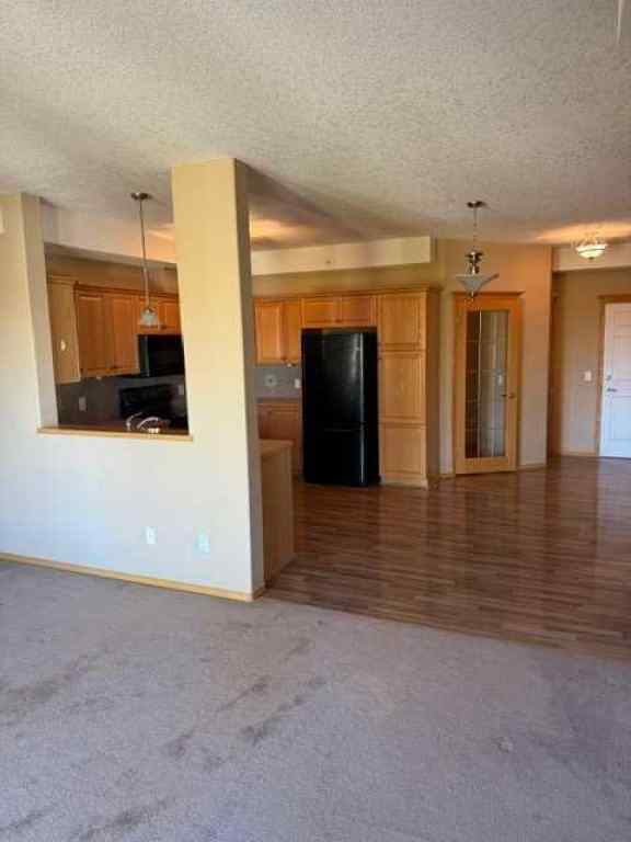 MLS® A2262622 - Unit #203 15 Everstone Drive SW in Evergreen Calgary, Residential