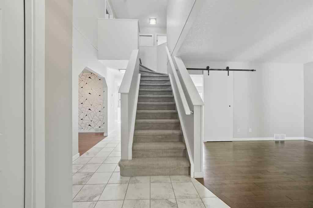 MLS&reg; # A2262637 - 161 Douglasbank Way SE in Douglasdale/Glen Calgary, Residential Open Houses