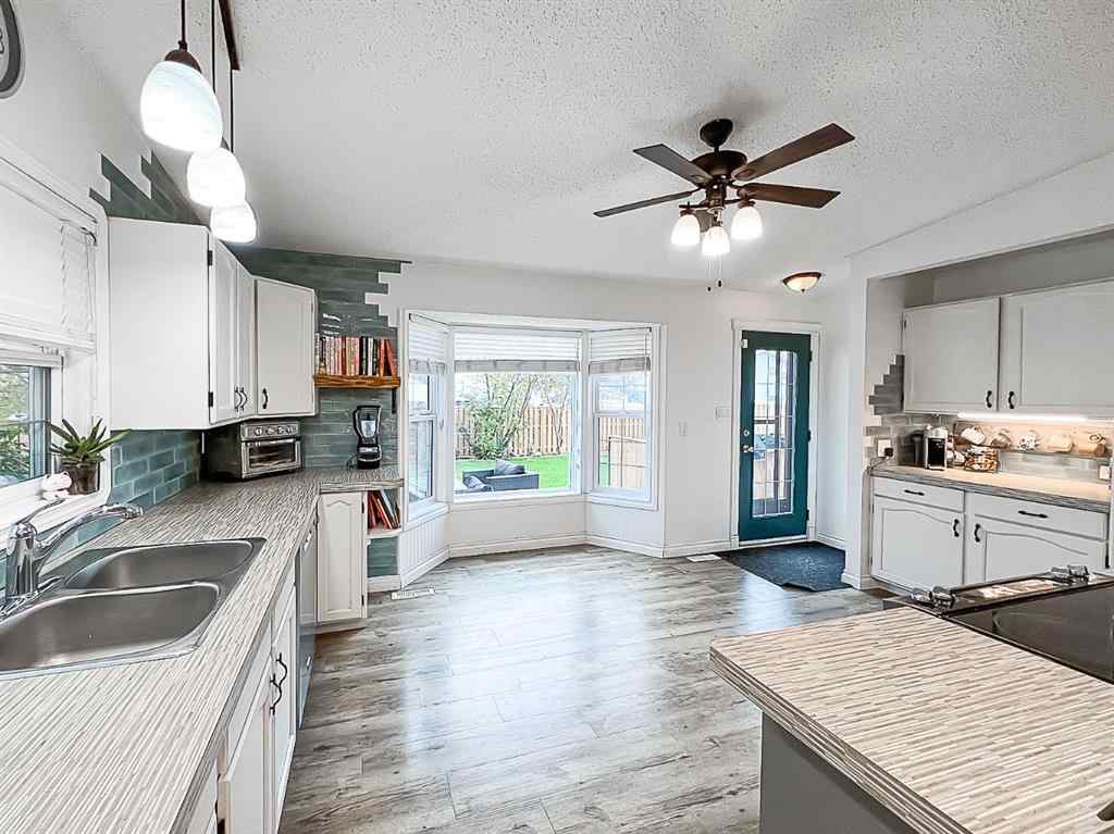 MLS® A2262644 - 9438 63 Avenue  in Country Club Estates Grande Prairie, Residential