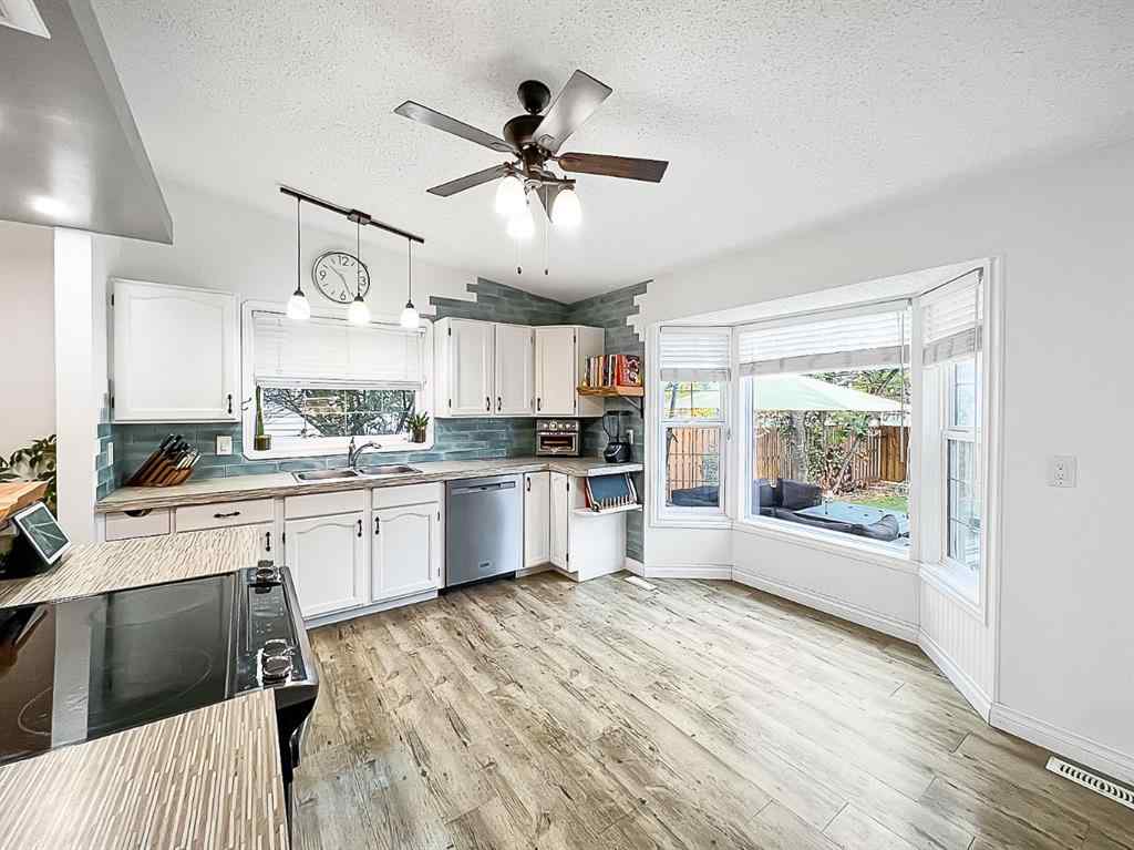 MLS® A2262644 - 9438 63 Avenue  in Country Club Estates Grande Prairie, Residential