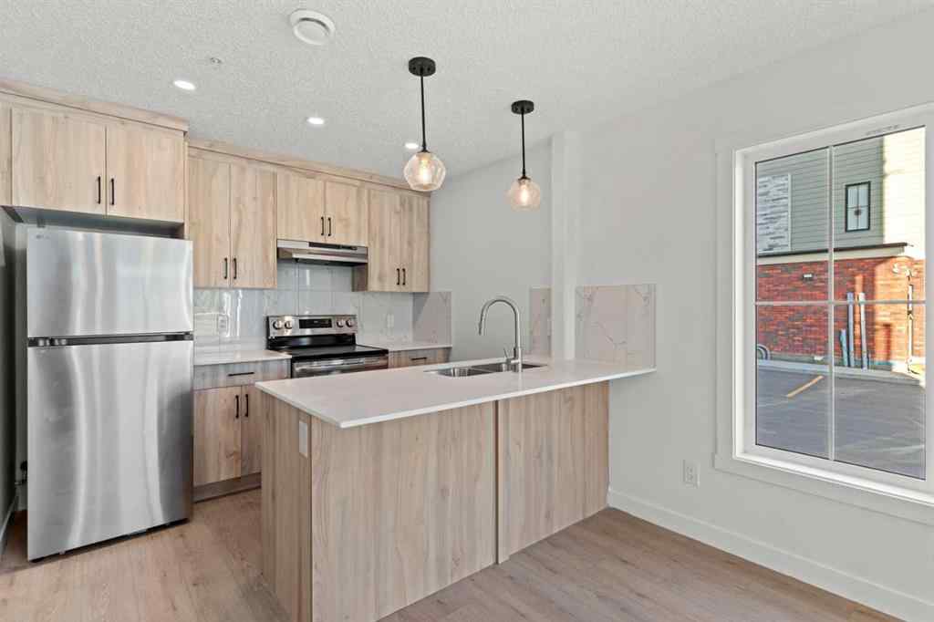 MLS® A2262676 - Unit #109 156 Park Street  in Greystone Cochrane, Residential