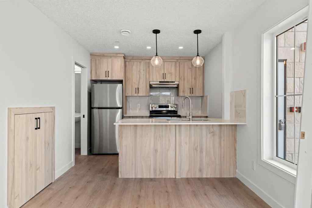 MLS® A2262676 - Unit #109 156 Park Street  in Greystone Cochrane, Residential