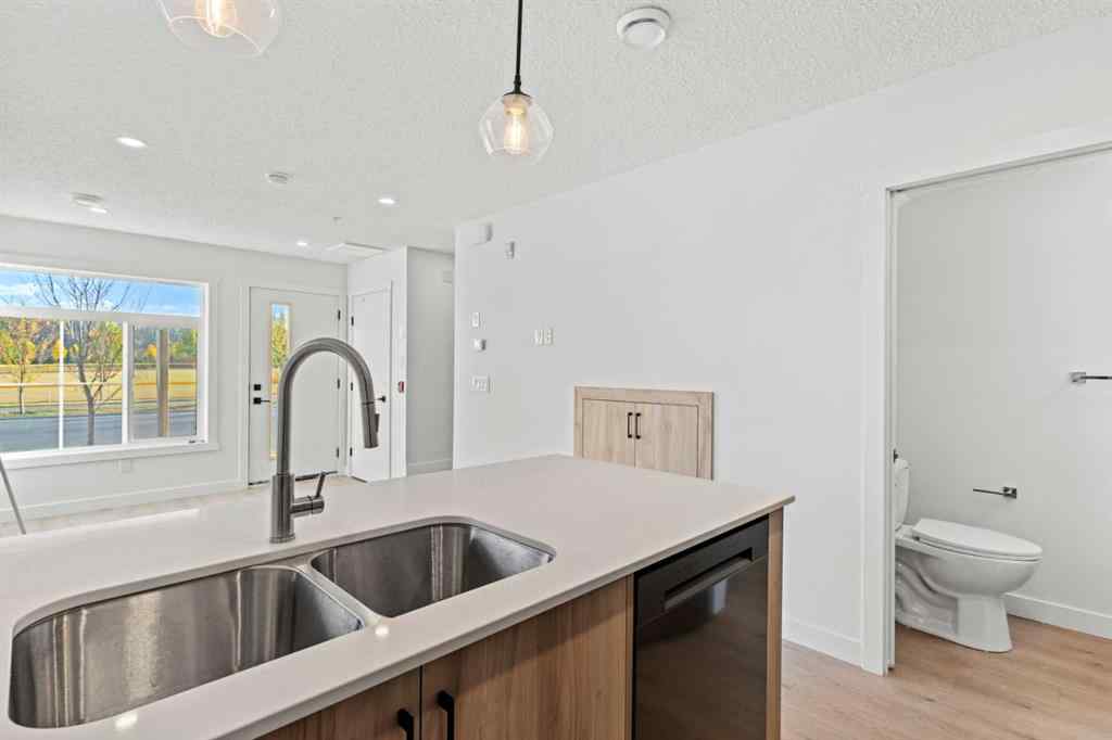 MLS® A2262676 - Unit #109 156 Park Street  in Greystone Cochrane, Residential